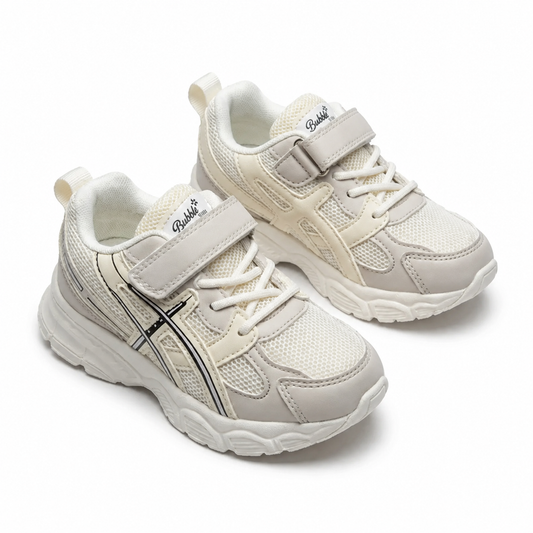 Baskets enfant unisexe beige et crème importées d'Espagne – vue 3/4 sur fond blanc – pointures 25 au 36 – BOMBAS Maroc, livraison à domicile (COD)